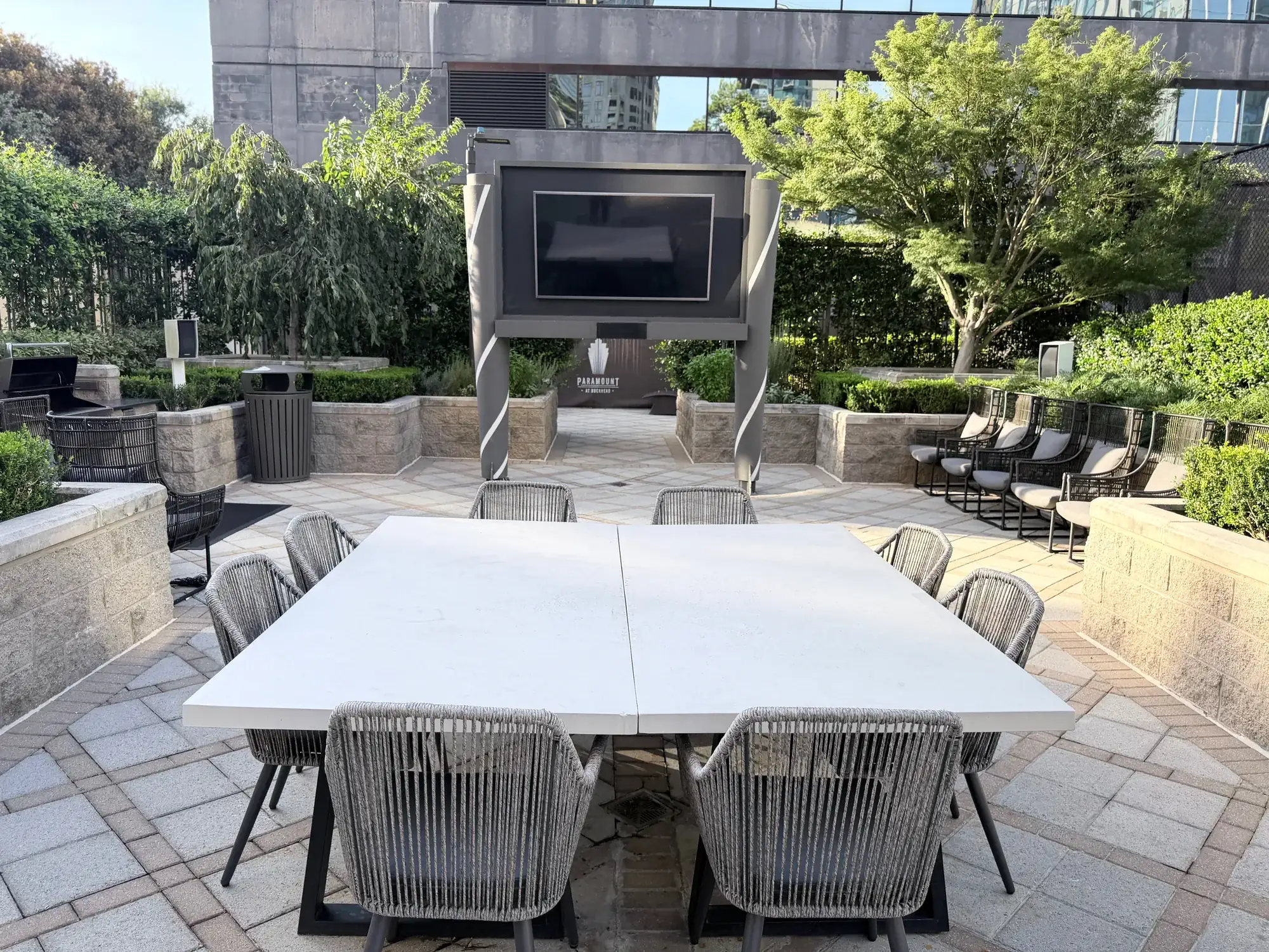 The open-air theater screen and communal dining table